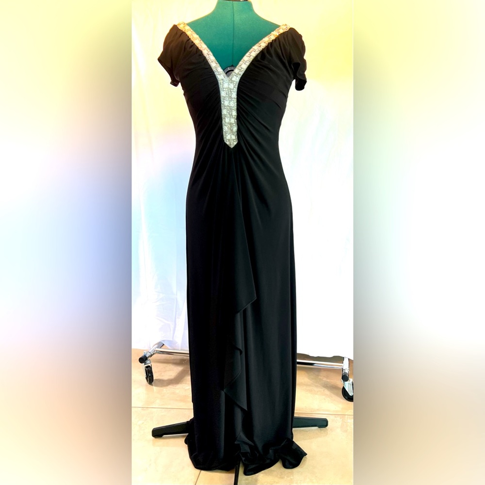 Black, formal dress with sequin trim.
